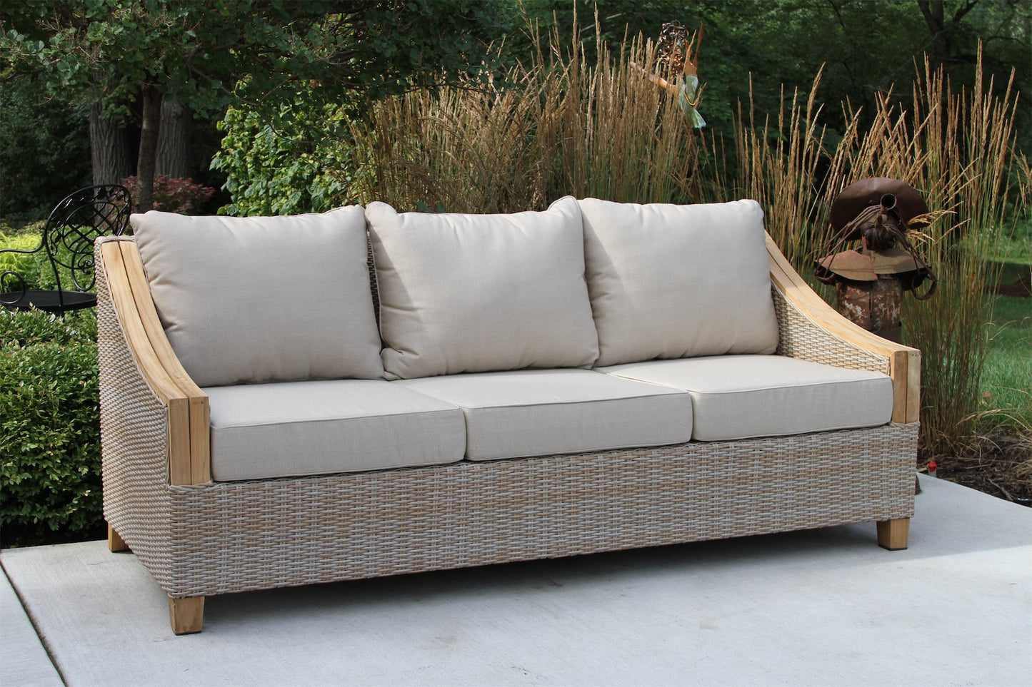 Outdoor Interiors TNA7000 Teak & Wicker Sofa with Sunbrella Cushions & Pillows