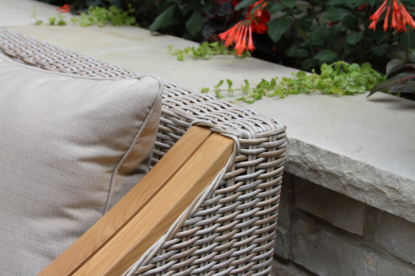 Outdoor Interiors TNA7000 Teak & Wicker Sofa with Sunbrella Cushions & Pillows